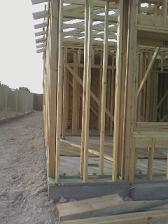 house framing, wood framing construction, frame a house, house under construction, timber frame houses